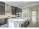 Spacious kitchen featuring stainless steel appliances and a large island at 30 W Palm Ln, Phoenix, AZ 85003