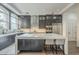 Gourmet kitchen with island seating, stainless steel appliances, and ample counter space at 30 W Palm Ln, Phoenix, AZ 85003