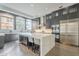 Modern kitchen with large island, stainless steel appliances, and ample counter space at 30 W Palm Ln, Phoenix, AZ 85003