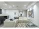 Bright living room featuring a large sectional sofa and modern decor at 30 W Palm Ln, Phoenix, AZ 85003