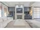 Elegant living room with a modern fireplace and large artwork at 30 W Palm Ln, Phoenix, AZ 85003
