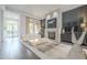 Living room features a modern fireplace and hardwood floors at 30 W Palm Ln, Phoenix, AZ 85003