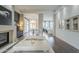 Open living room with hardwood floors and a fireplace at 30 W Palm Ln, Phoenix, AZ 85003