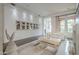 Bright living room features hardwood floors, large windows, and a neutral color palette at 30 W Palm Ln, Phoenix, AZ 85003