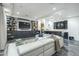 Modern media room with large sectional sofa and built-in shelving at 30 W Palm Ln, Phoenix, AZ 85003