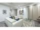Comfortable media room with white sectional and large art at 30 W Palm Ln, Phoenix, AZ 85003