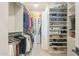 Large walk-in closet with ample shelving and hanging space at 30 W Palm Ln, Phoenix, AZ 85003