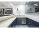 Contemporary wet bar featuring a built-in mini-fridge and shelving at 30 W Palm Ln, Phoenix, AZ 85003