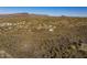 Aerial view showing a home nestled in the desert landscape at 37300 N School House Rd, Cave Creek, AZ 85331