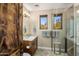 Bathroom with walk-in shower and granite countertop at 37300 N School House Rd, Cave Creek, AZ 85331