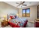 Bedroom with mountain views and rustic decor at 37300 N School House Rd, Cave Creek, AZ 85331