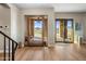 Bright entryway with hardwood floors and views of patio and mountains at 37300 N School House Rd, Cave Creek, AZ 85331