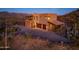 Mountaintop home showcasing architectural details and expansive views at 37300 N School House Rd, Cave Creek, AZ 85331