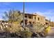Contemporary home nestled into a desert mountainside at 37300 N School House Rd, Cave Creek, AZ 85331