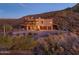 Luxury home with desert landscape and mountain backdrop at 37300 N School House Rd, Cave Creek, AZ 85331