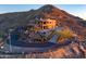 Luxury home with a large driveway and a three-car garage at 37300 N School House Rd, Cave Creek, AZ 85331