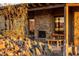 Outdoor fireplace with mountain backdrop creates cozy ambiance at 37300 N School House Rd, Cave Creek, AZ 85331
