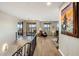 Spacious hallway with hardwood floors and access to upper level at 37300 N School House Rd, Cave Creek, AZ 85331