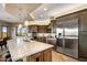 Modern kitchen features granite countertops and stainless steel appliances at 37300 N School House Rd, Cave Creek, AZ 85331
