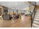 Spacious living area with hardwood floors, fireplace, and mountain views at 37300 N School House Rd, Cave Creek, AZ 85331