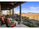 Covered patio boasts mountain views and comfortable seating at 37300 N School House Rd, Cave Creek, AZ 85331