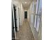 Bright hallway with tile floors and two doors at 4041 S Prairie Zinnia Dr, Gold Canyon, AZ 85118