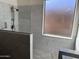 Spa-like shower with marble tile and glass enclosure at 4041 S Prairie Zinnia Dr, Gold Canyon, AZ 85118