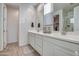 Modern bathroom with double vanity and plenty of counter space at 4428 N 92Nd Ln, Phoenix, AZ 85037