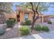 Two-story house with tan exterior, landscaped yard, and a two-car garage at 4513 E Vista Bonita Dr, Phoenix, AZ 85050