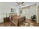 Bedroom showcasing a sleek bed, wood flooring, and a minimalist design at 4615 W Corral Rd, Laveen, AZ 85339