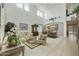 Bright and airy living room boasts soaring ceilings, clerestory windows and elegant furnishings at 4615 W Corral Rd, Laveen, AZ 85339