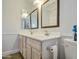 Bright bathroom with double vanity and updated fixtures at 5618 W Blackhawk Dr, Glendale, AZ 85308