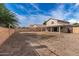 Spacious backyard with view of house at 6537 W Riva Rd, Phoenix, AZ 85043