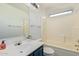 Well-lit bathroom with a shower/tub combo at 6537 W Riva Rd, Phoenix, AZ 85043