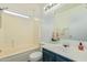 Clean bathroom with a tub, toilet and vanity at 6537 W Riva Rd, Phoenix, AZ 85043
