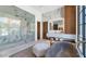 Beautiful bathroom featuring a glass shower, soaking tub, and modern vanity at 6836 E Hummingbird Ln, Paradise Valley, AZ 85253