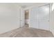 Bedroom with carpet, white walls and double door closet at 7042 E Diamond St, Scottsdale, AZ 85257