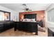 Main bedroom with a king-size bed, ceiling fan, and built-in dresser at 7137 W Mercer Ln, Peoria, AZ 85345