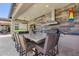 Outdoor kitchen with bar seating and grill at 9216 W Via Del Sol --, Peoria, AZ 85383