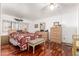 Spacious bedroom with wood flooring and ample closet space at 9333 E University Dr # 147, Mesa, AZ 85207