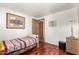 Small bedroom with wood floors and a built-in closet at 9333 E University Dr # 147, Mesa, AZ 85207