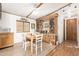 Bright dining area with wood table and chairs, built-in hutch at 9333 E University Dr # 147, Mesa, AZ 85207