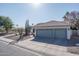 Two-car garage and desert landscaping, inviting curb appeal at 11503 W Cyprus Dr, Avondale, AZ 85392