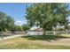 Scenic lakefront view with geese and walking path, peaceful community setting at 11503 W Cyprus Dr, Avondale, AZ 85392