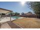 Relaxing pool area with a patio and beautiful landscaping at 11503 W Cyprus Dr, Avondale, AZ 85392