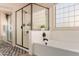 Spa-like bathroom featuring a large shower and a soaking tub at 117 E Blue Lagoon Dr, Casa Grande, AZ 85122