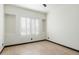 Bedroom with plantation shutters and ceiling fan at 11850 E Del Timbre Dr, Scottsdale, AZ 85259