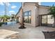 Back exterior view showing pool and access from the house at 11850 E Del Timbre Dr, Scottsdale, AZ 85259