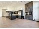 Modern kitchen featuring dark cabinetry and granite countertops at 11850 E Del Timbre Dr, Scottsdale, AZ 85259