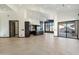 Modern kitchen with dark cabinetry, stainless steel appliances, and an island at 11850 E Del Timbre Dr, Scottsdale, AZ 85259